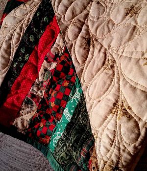 1/8 Quilt In Sunshine on Back of Couch